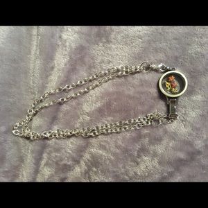 Silver wrap bracelet with cute bus charm.